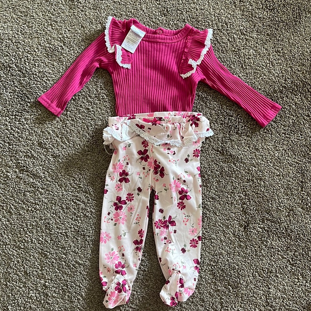 New, never worn, pink body suit with footed pants set